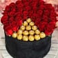 Imported Red Roses and original Italian Ferrero Rochers in round hatbox - theflowers.pk